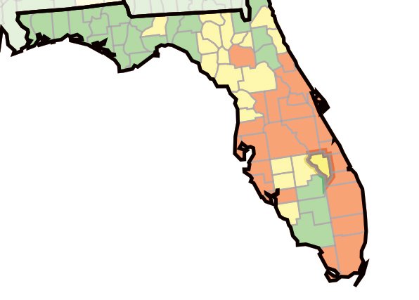 The Centers for Disease Control (CDC) map shows counties at high risk for COVID-19 in red, medium risk in yellow and low risk in green. Okeechobee County (medium risk in yellow) is outlined.